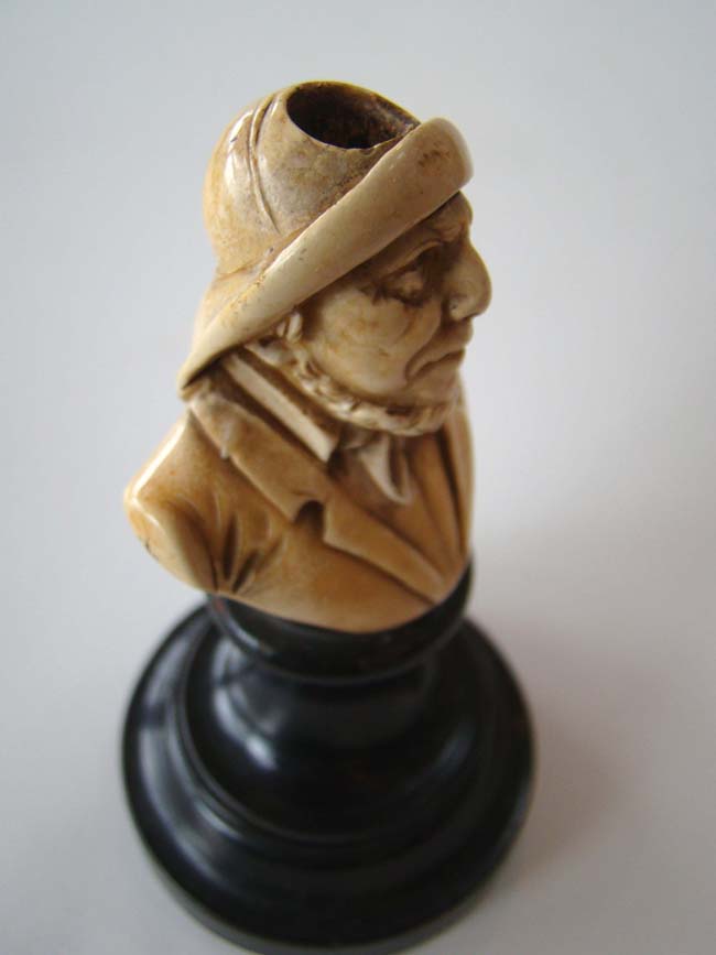 A small and charming ivory or bone bust of a fisherman mounted on a stand circa 1880 — image 4